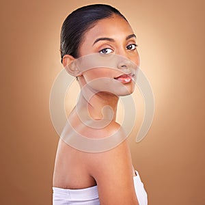 Beauty, makeup and portrait of Indian woman for skincare, healthy skin and facial treatment in studio. Dermatology