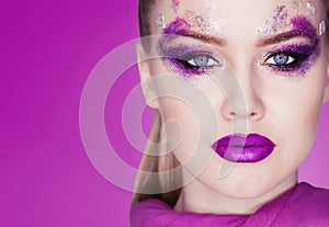 Beauty Makeup. Purple Make-up and Colorful Bright Nails. Beautiful Girl Close-up Portrait