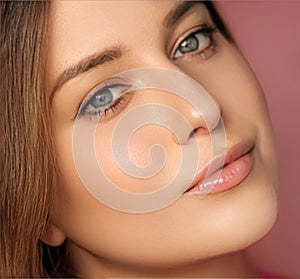 Beauty, makeup and skincare cosmetics model face portrait on pink background, beautiful woman with natural make-up