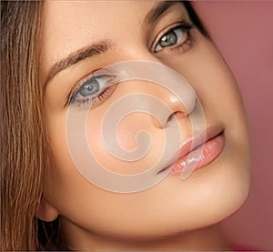 Beauty, makeup and skincare cosmetics model face portrait on pink background, beautiful woman with natural make-up