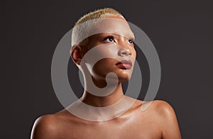 Beauty, makeup and skincare, profile of woman in dark studio with platinum hair isolated on grey background. Art