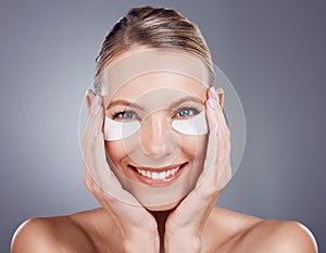 Beauty mask, eyes and portrait of woman on gray background for wellness, cosmetics and facial treatment. Skincare