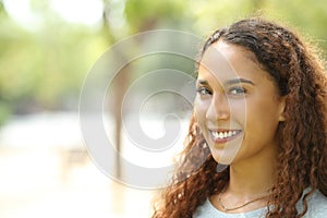 Beauty mixed race woman posing with perfect smile