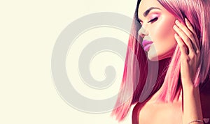 Beauty model girl with perfect healthy hair and beautiful makeup. Ombre pink dyed hair