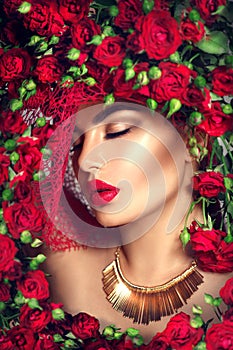 Beauty model girl with red roses flower wreath and fashion makeup