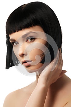 Beauty model with perfect glossy black hair. Close-up portrait.