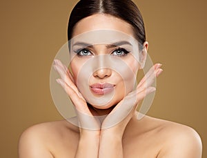 Beauty Model showing Cheekbones and Full Lips. Beautiful Woman Face Skin Care. Women Dermal Filler and Permanent Make up