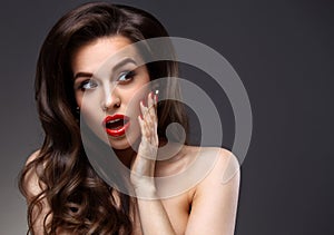 Beauty Model Woman with Long Brown Wavy Hair