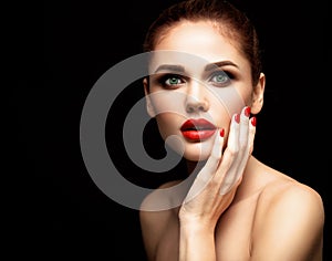 Beauty Model Woman with Long Brown Wavy Hair. Healthy Hair and Beautiful Professional Makeup. Red Lips and Smoky Eyes