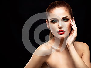 Beauty Model Woman with Long Brown Wavy Hair. Healthy Hair and Beautiful Professional Makeup. Red Lips and Smoky Eyes