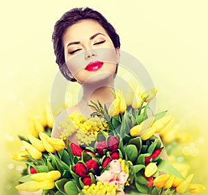 Beauty model woman with spring flowers