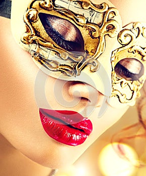 Beauty model woman wearing venetian mask