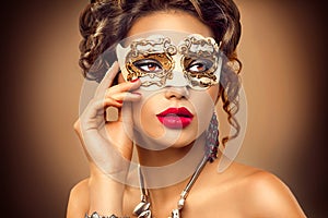 Beauty model woman wearing venetian mask