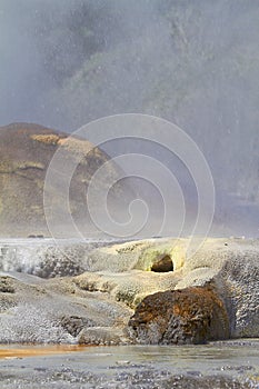 The beauty of Mother Nature. mist descending over a rocky tidal pool.
