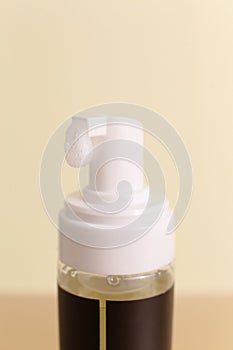 Beauty natural skincare products development concept. Dermatologist cosmetic skincare bottle with pump dispenser and