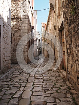 Beauty old narrow alley in UNESCO town, Trogir