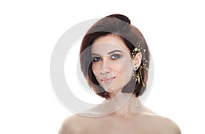 Beauty portrait of adult adorable fresh looking brunette woman with gorgeous makeup diy headpiece bob hairdo posing against isolat