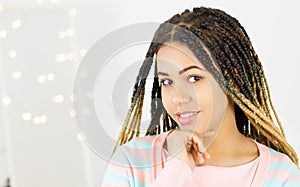 Beauty portrait of african american woman with afro hairstyle and glamour makeup