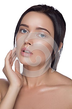 Beauty Portrait. Beautiful Spa Woman Touching her Face. Perfect Fresh Skin. Pure Model. Youth and Care Concept