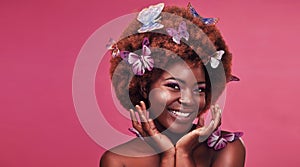 Beauty, portrait and black woman with butterflies in studio with creative, art and fantasy. Cosmetics, smile and face of