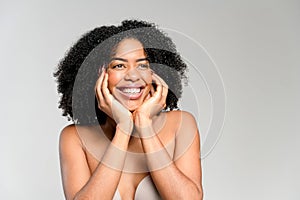 Beauty portrait with a charming African-American woman  in white photo