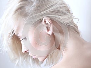 Beauty portrait of delicate blonde woman.