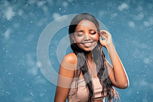 Beauty portrait of happy, adorable african american young woman with glamour makeup