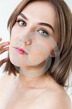 Beauty portrait of a pretty girl with makeup