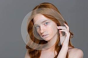 Beauty portrait of a pretty redhead woman