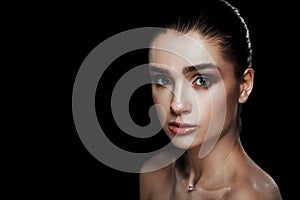 Beauty Portrait of Pretty Woman with Strobing Makeup. Wet Body E