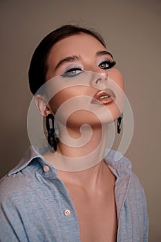 Beauty portrait with professional blue makeup. Fashion portrait