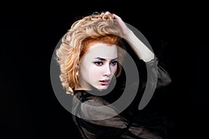 Beauty portrait of redhead female face. High fashion model girl. Beautiful high fashion female model with beauty face