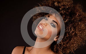 Beauty portrait of smiling girl with afro.