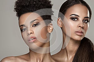 Beauty portrait of two african american girls.