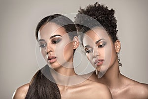 Beauty portrait of two african american girls.