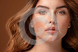 Beauty portrait of woman with freckles photo