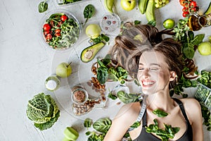 Portrait of a beautiful woman with healthy food photo