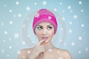 Beauty portrait of young beautiful woman over snowy