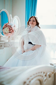 Beauty portrait young bride on light background