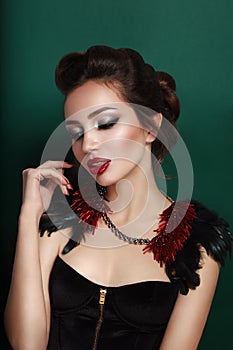 Beauty portrait of young brunette woman in black corset