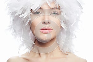 Beauty portrait of young woman in white wig