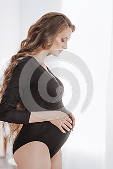 Beauty Pregnant Woman in black clothes