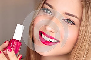 Beauty product, makeup and cosmetics, face portrait of beautiful woman with nail polish, manicure and matching pink