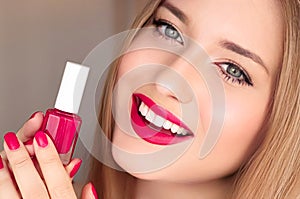 Beauty product, makeup and cosmetics, face portrait of beautiful woman with nail polish, manicure and matching pink