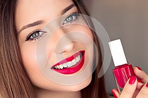 Beauty product, makeup and cosmetics, face portrait of beautiful woman with nail polish, manicure and matching red