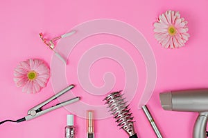 Beauty products flat lay on pink background