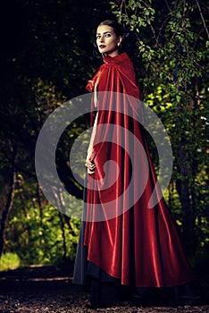 Beauty in red cloak photo