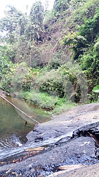 the beauty of the river with big rocks?