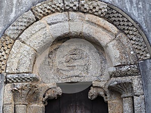 Romanesque doorway of the church of san martiÃÂ±o de moldes, la coruÃÂ±a, spain, europe photo