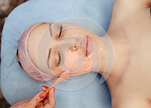 Beauty salon, applying of Alginate Peel-Off Powder facial Mask